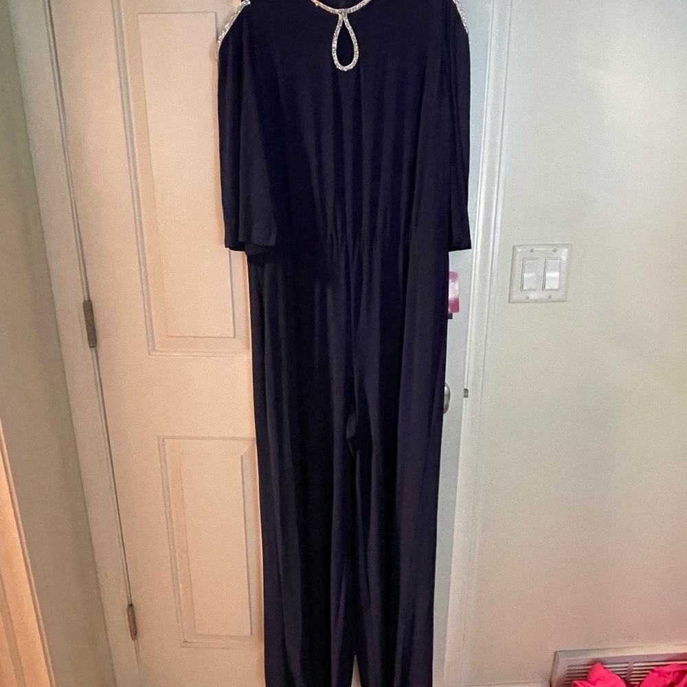 Elegant Blue Jumpsuit with Embellished Neckline